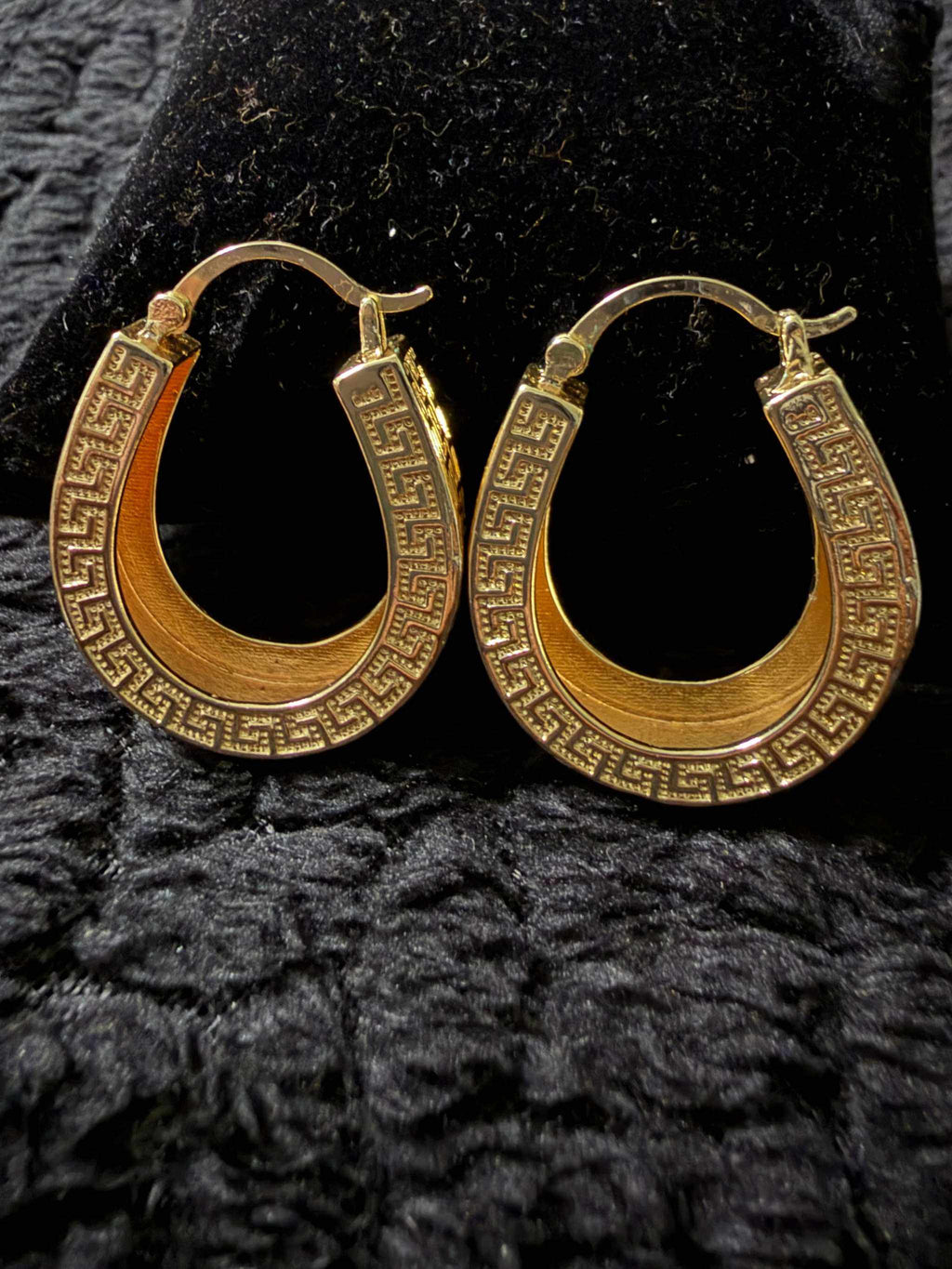 Greek Key gold-filled hoop earrings with classic geometric pattern and polished finish in a horseshoe shape