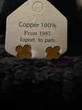 Clover Earrings made of copper with a polished finish and silver beaded edge detailing in a four-leaf clover shape.