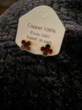 Burgundy Clover Earrings made of copper with a deep burgundy clover design and gold-tone beaded edges.